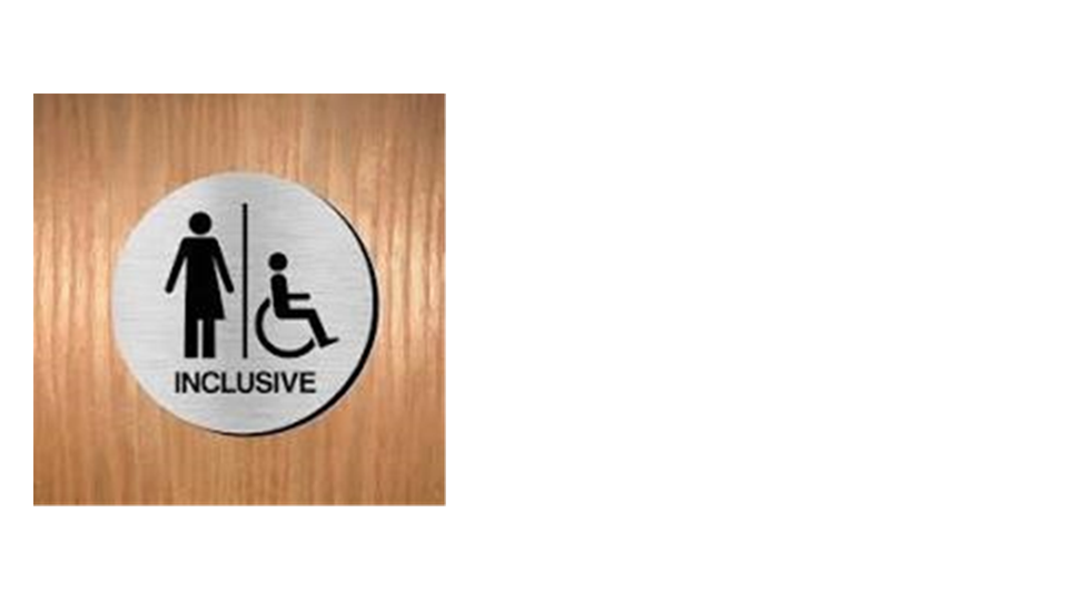 Photo of a grey inclusive toilet sign on a wooden door, showing it is gender inclusive and suitable for those with disabilities